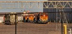 The Setting Texas Sun Reflects Off The Very, Very, Very Brand New BNSF Swoosh Logo Paint Scheme's and Primered Locomotives at The Wabtec Locomotive Plant Fort Worth Texas. 